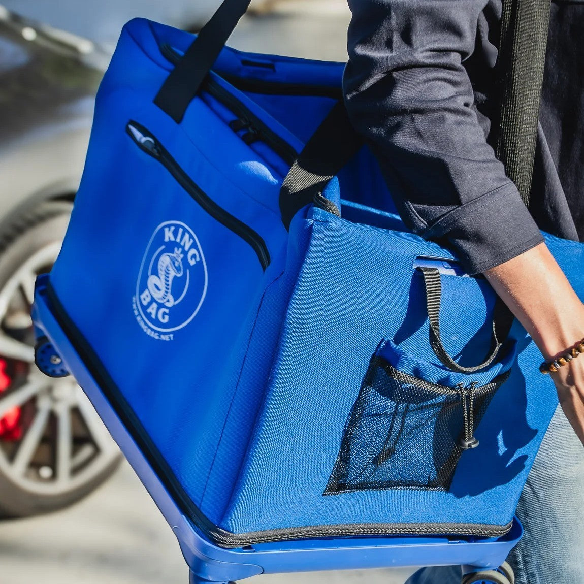 KINGBAG Produktaufnahme einer blauen Tasche mit Seitentasche